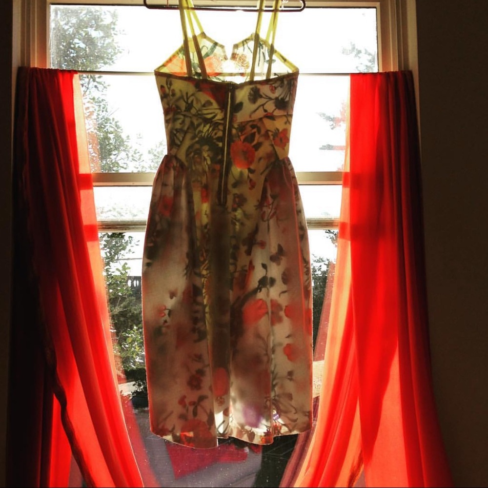 Hand stitched cotton dress lined with the famous Gucci pattern.